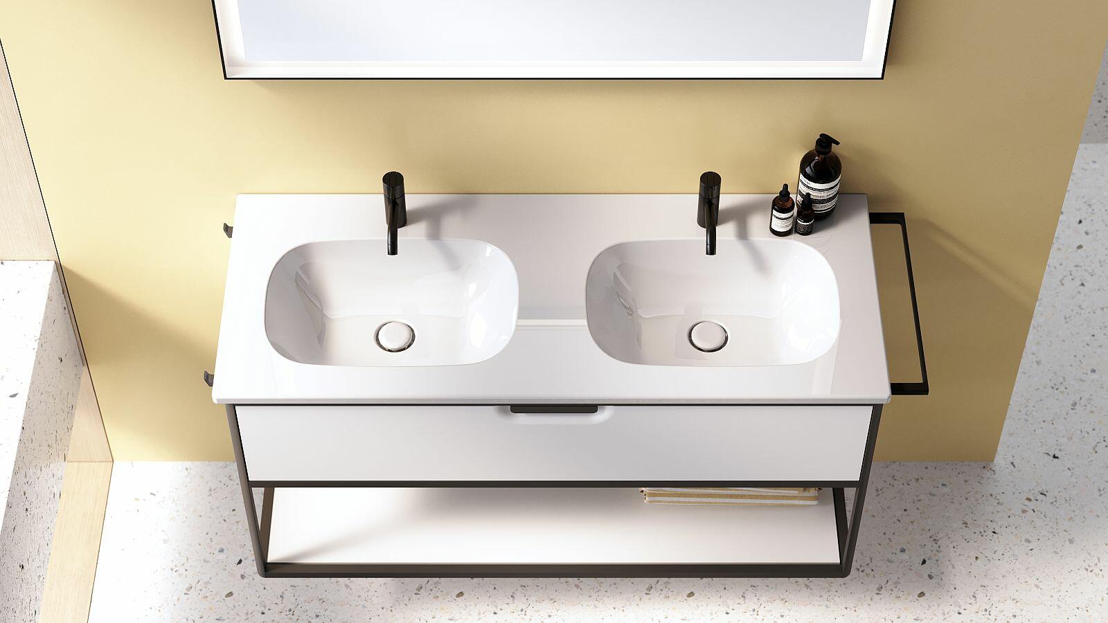 Doppelwaschtisch mit zwei gescwungenen Waschbecken und dunklen Alurahmen
